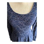 Free People Stunning blue lace dress, fit and flare, pleated skirt, long sleeves, little bit of stretch, fully lined except sleeves, excellent condition, size small Measurements: Bust: armpit to armpit 16-18 inches Waist: side to side 14-16 inches Length: shoulder seam to bottom 33 inches Photo 5