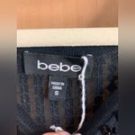 Bebe  Black Short Sleeve Sequin Disco Dot Mini Dress.      Size-Small Photo 1