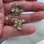 Vintage rhinestone encrusted butterfly earrings. Gold Photo 5