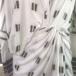 Elegant Leisure Asymmetric Casual Midi Dress Print Twist Design Shirt Dress Photo 4