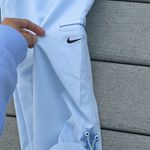 Nike  Loose Fit Capris with Elastic Waist and Front Belt Photo 6