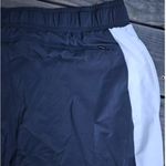 Athleta Derek Lam Black and White Pants with Green Accent size L Photo 1