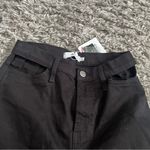 Adika Black cutout pocket flare jeans size small Photo 1