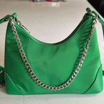 Wild Fable  cross body clutch purse.  Satin Green. Adjustable strap. Like new. Photo 0