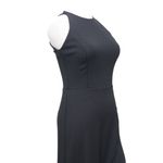 Betsy and Adam . Arielle Scuba Crepe Ruffle Slit Gown. Photo 9