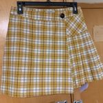 Jolt Yellow, Black, and White Checkered  Pleated Skirt Photo 0