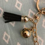 Rhinestone Cowgirl Black Fleur De Lis Keychain NWOT. Has Tassel and gold ball. Photo 2