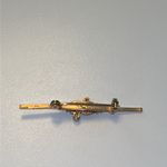 Vintage 1970s gold tone feminine bar brooch with red stones Photo 3