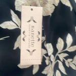 Nanette Lepore Black & Cream Floral print high low smocked dress NWOT Photo 3