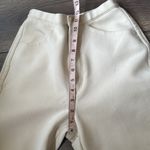 Uniqlo  emits ivory high waisted stretchy oversized pants Photo 7