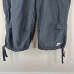 Nike women's small cropped capri drawstring hem and waist pants active grey Photo 2