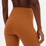 Girlfriend Collective High-Rise Biker Shorts in Caramel Photo 5