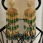 Cato Elegant Beaded Green and Gold Earrings Add a touch of elegance with these stunning beaded earrings. Photo 0