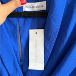 Bella and Blue Tie Photo 1