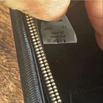 Giorgio Armani  leather clutch with magnetic closure. Interior: silk. Never worn. Photo 5