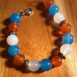 Red, White, and Blue Agate And Hematite Stainless Steel Bracelet Photo 1