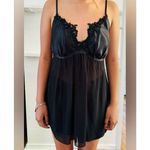 Cosmopolitan  black satin lingerie set. Photo 6