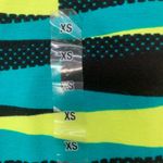 City Streets  Black and Green Patterned Leggings Photo 1