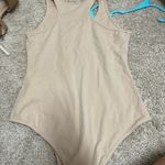 Cute nude bodysuit tank. Size medium. Photo 1