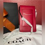 Coach Snap Phone Crossbody In Signature Canvas Photo 4