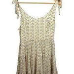 Altar'd State Altar’d State Tie Strap Floral Ruffle Crochet Mini Dress in Yellow Size S Photo 0