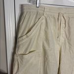 Anthropologie  cargo style straight leg drawstring pants in ivory Photo 1
