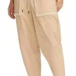 Nike Women’s Essential Woven Loose High Rise Curve Pants Shearling Pockets Med Photo 0