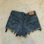 Levi's  30 501 high rise dark gray black distressed denim shorts in size 26 Photo 2