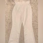 NWOT NADINE MERABI Colette White Feather Strapless belted Jumpsuit sz 12 Photo 5