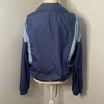 Adidas  wind breaker running jacket. Size Medium. Drawstring. Snap closure. Photo 2