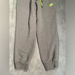 Nike  Joggers in Gray with Neon Green Details Photo 1