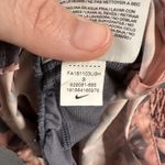 Nike  Dri-FIT Running Shorts Womens Small Pink Floral Lined Zip Pocket 929081-685 Photo 11
