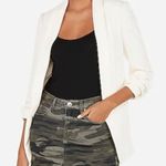 EXPRESS  Mid Rise Raw Cut Camo Mini Skirt Photo 0
