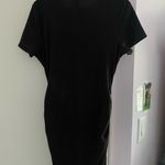 Divided Black mini dress Photo 3
