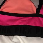 PINK - Victoria's Secret PINK Sport swim suit bikini top orange and pink in color size small spor…​ Photo 5