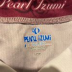 Pearl Izumi NWT  sleeveless quarter zip purple & white size L cycling top. Photo 3