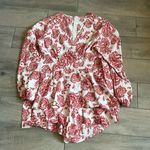 Printed long sleeve romper Size L Photo 0