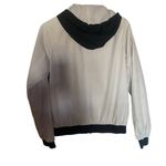 Nike The windbreaker large black light stain on back see picture Photo 5