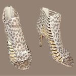 Ivanka Trump  gold and taupe leopard print strappy ankle boots! Photo 2