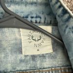 Boutique Distressed Denim Jacket Photo 3