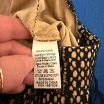 BANJUL  NWOT High-Waisted Black and Tan Crochet/ Lace Tiered Fringe Flare Pants Photo 5