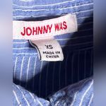 Johnny Was Button down embroidered shirt size XS.
Embroidered backside Photo 13