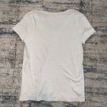 Universal Threads lightly worn tee Photo 1