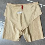 Spanx Shaping Tummy Control Mid Thigh
Short size Large Photo 2