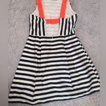 Jealous Tomato Dark Navy and White Striped Boutique Dress w/ Open Back & Orange Accent Straps. Photo 3