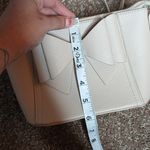 Grossi cream bow front pebble leather mini crossbody purse Gold Photo 12