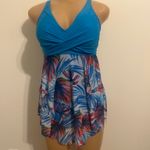 Patipati Stylish blue swimsuit dress with floral pattern. Perfect for beach days. Photo 1