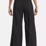 Reebok Women’s size XS Women's Classics Volume Pants windbreaker wide leg black Photo 1