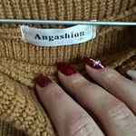 Angashion Off Shoulder Fringe Gold Sweater Photo 4