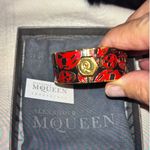 Alexander McQueen  Gold Bracelet with Red Skull Design Photo 1